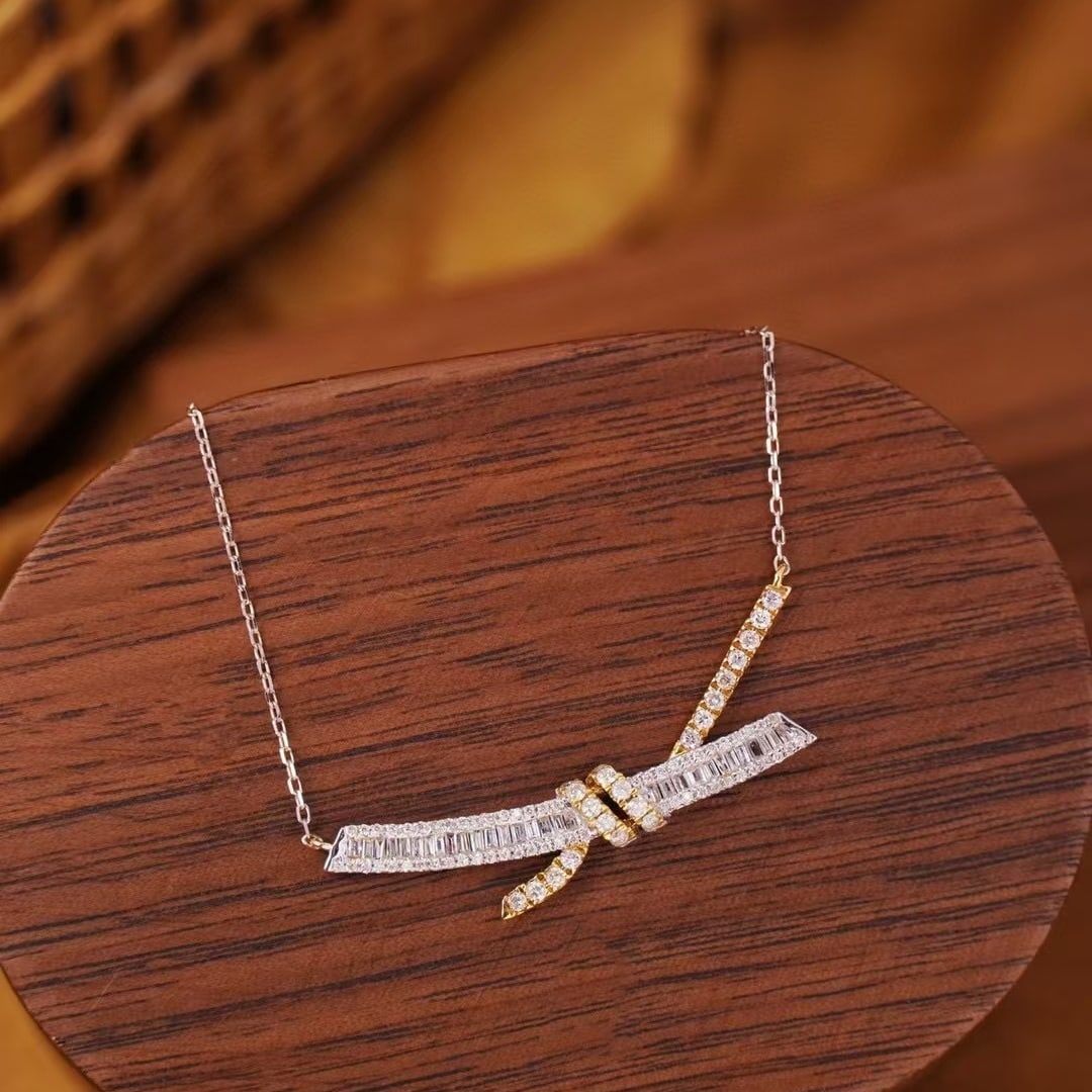 14k Gold 0.55 Ct Natural H Diamond Necklace: Ref:230984012 // gold content:14k gold // main gemstone:diamond // shape:multiply // carat weight:0. 55ct // clarity grade:vs-si // color:h // treatment:natural // Low Estimate: 2400 Condition: New