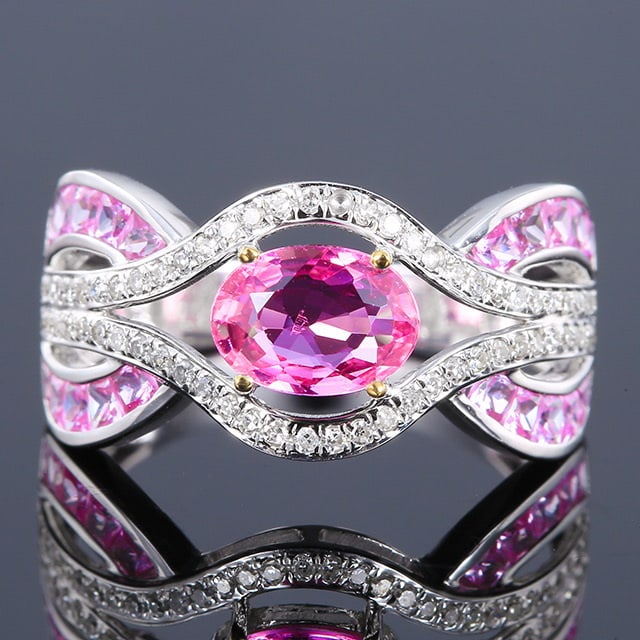 14k Gold 1.62 Ctw Natural Padparadscha Sapphire & Sapphire Ring: Ref:230984020 // gold content:14k gold // ring size:7. 25us // // main gemstone:padparadscha sapphire // shape:oval // carat weight:0. 9ct // color:orangish pink // treatment:natural // // adjacent ge