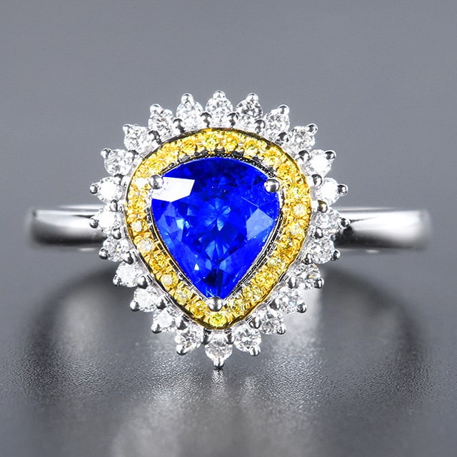 14k Gold 1.43 Ctw Natural Sapphire & Diamond Ring: Ref:230984036 // gold content:14k gold // ring size:7. 25us // // main gemstone:sapphire // shape:pear // carat weight:1. 12ct // color:royal blue // treatment:natural // // adjacent gemstone 2 :