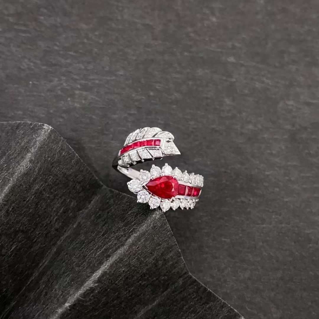14k Gold 1.61 Ctw Natural Ruby & Ruby Ring: Ref:230984069 // gold content:14k gold // ring size:7. 25us // // main gemstone:ruby // shape:pear // carat weight:1. 01ct // color:pigeonblood red // treatment:natural // // adjacent gemstone 2 :