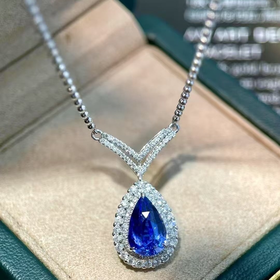 14k Gold 3.19 Ctw Natural Sapphire & Diamond Necklace: Ref:230984104 // gold content:14k gold // main gemstone:sapphire // shape:pear // carat weight:2. 59ct // color:cornflower blue // treatment:natural // // adjacent gemstone 2 : diamond // shape:round 