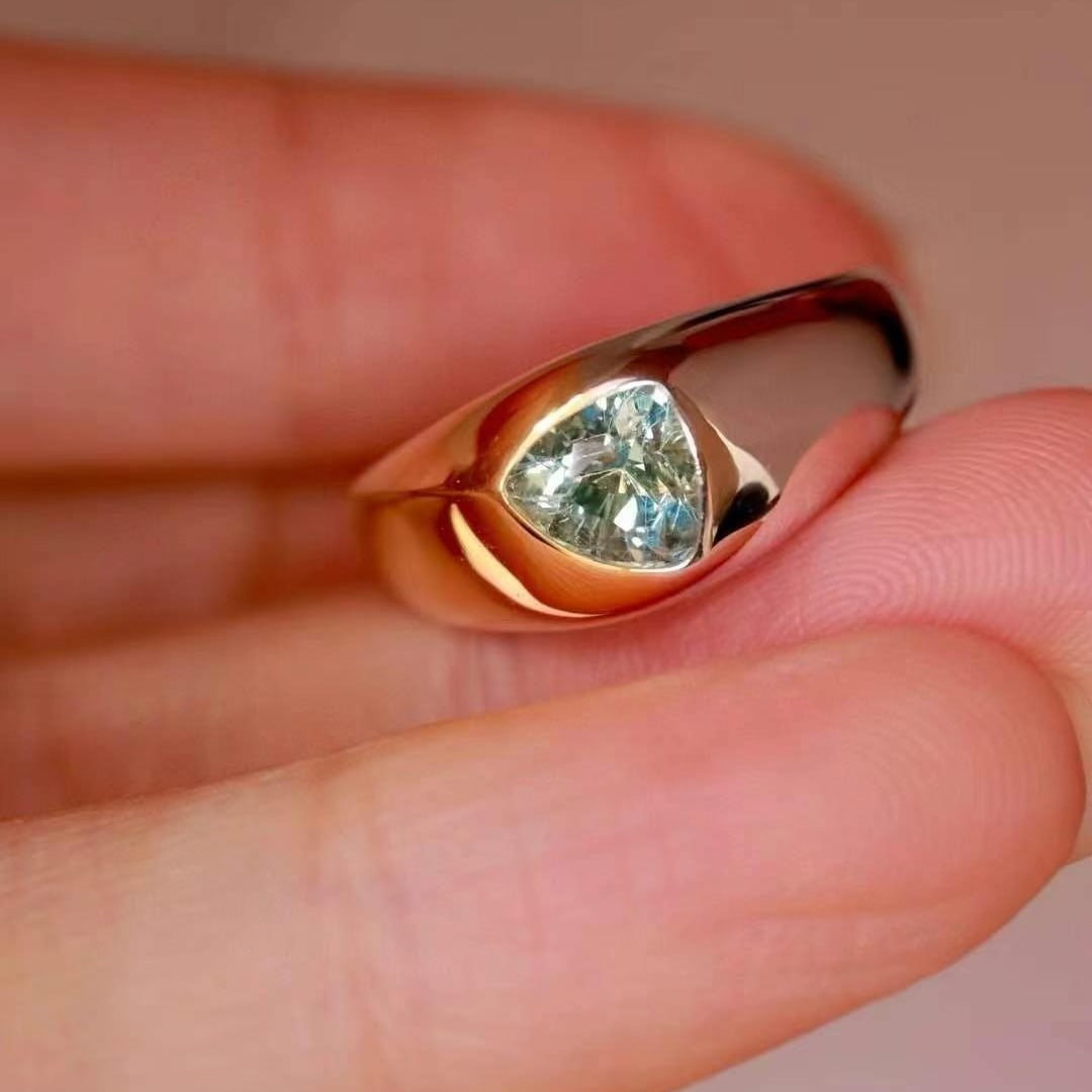 14k Gold 1.01 Ct Natural Sapphire Ring: Ref:230984111 // gold content:14k gold // ring size:7. 25us // // main gemstone:sapphire // shape:triangle // carat weight:1. 01ct // color:green // treatment:natural // Condition: New Low Estimate: