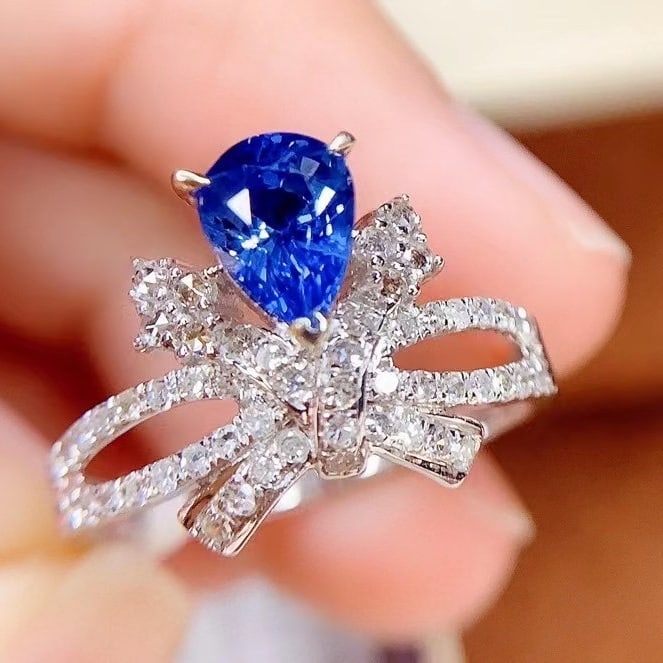 14k Gold 1.35 Ct Natural Sapphire & Diamond Ring: Ref:230984119 // gold content:14k gold // ring size:7. 25us // // main gemstone:sapphire // shape:pear // carat weight:1. 35ct // color:blue // treatment:natural // // adjacent gemstone 2 : diamond