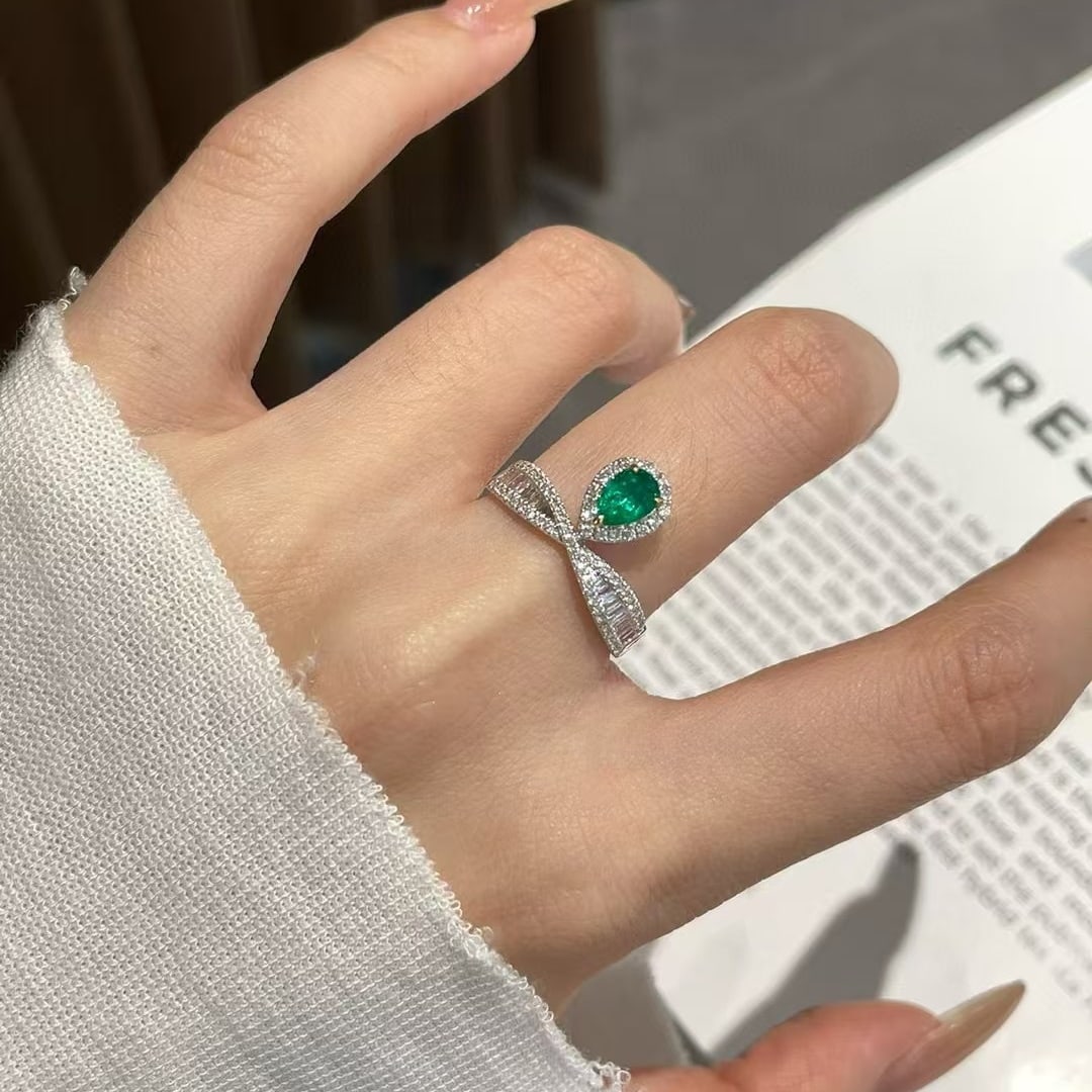 14k Gold 0.2 Ct Vivid Green Natural Emerald & Diamond Ring: Ref:230984139 // gold content:14k gold // ring size:7. 25us // // main gemstone:emerald // shape:pear // carat weight:0. 2ct // color:vivid green // treatment:natural // // adjacent gemstone 2 :