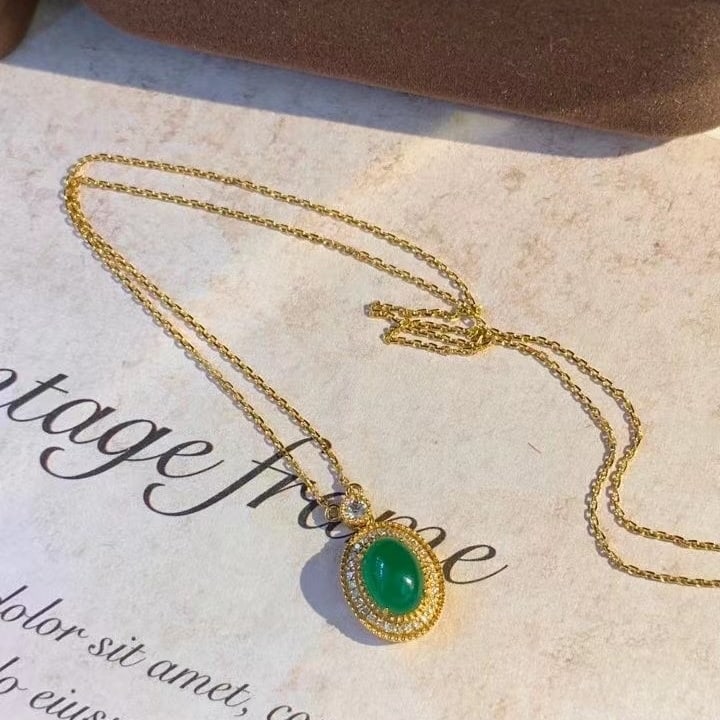 14k Gold 1.3 Ct Natural Emerald & Diamond Necklace: Ref:230984141 // gold content:14k gold // main gemstone:emerald // shape:oval // carat weight:1. 3ct // color:green // treatment:natural // // adjacent gemstone 2 : diamond // number of stones:31 //