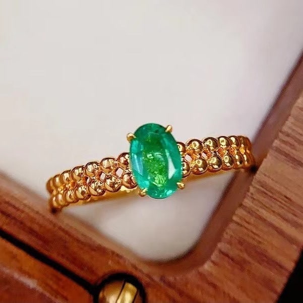 14k Gold 0.65 Ct Natural Emerald Ring: Ref:230984144 // gold content:14k gold // ring size:7. 25us // // main gemstone:emerald // shape:oval // carat weight:0. 65ct // color:green // treatment:natural // High Estimate: 3000 Condition: New