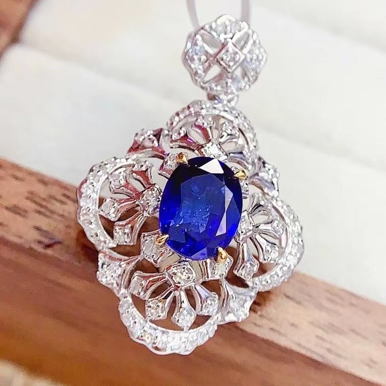 14k Gold 1.3 Ct Natural Sapphire & Diamond Pendant( Without Chain ): Ref:230984163 // gold content:14k gold // main gemstone:sapphire // shape:oval // carat weight:1. 3ct // color:blue // treatment:natural // // adjacent gemstone 2 : diamond // number of stones:77 // s