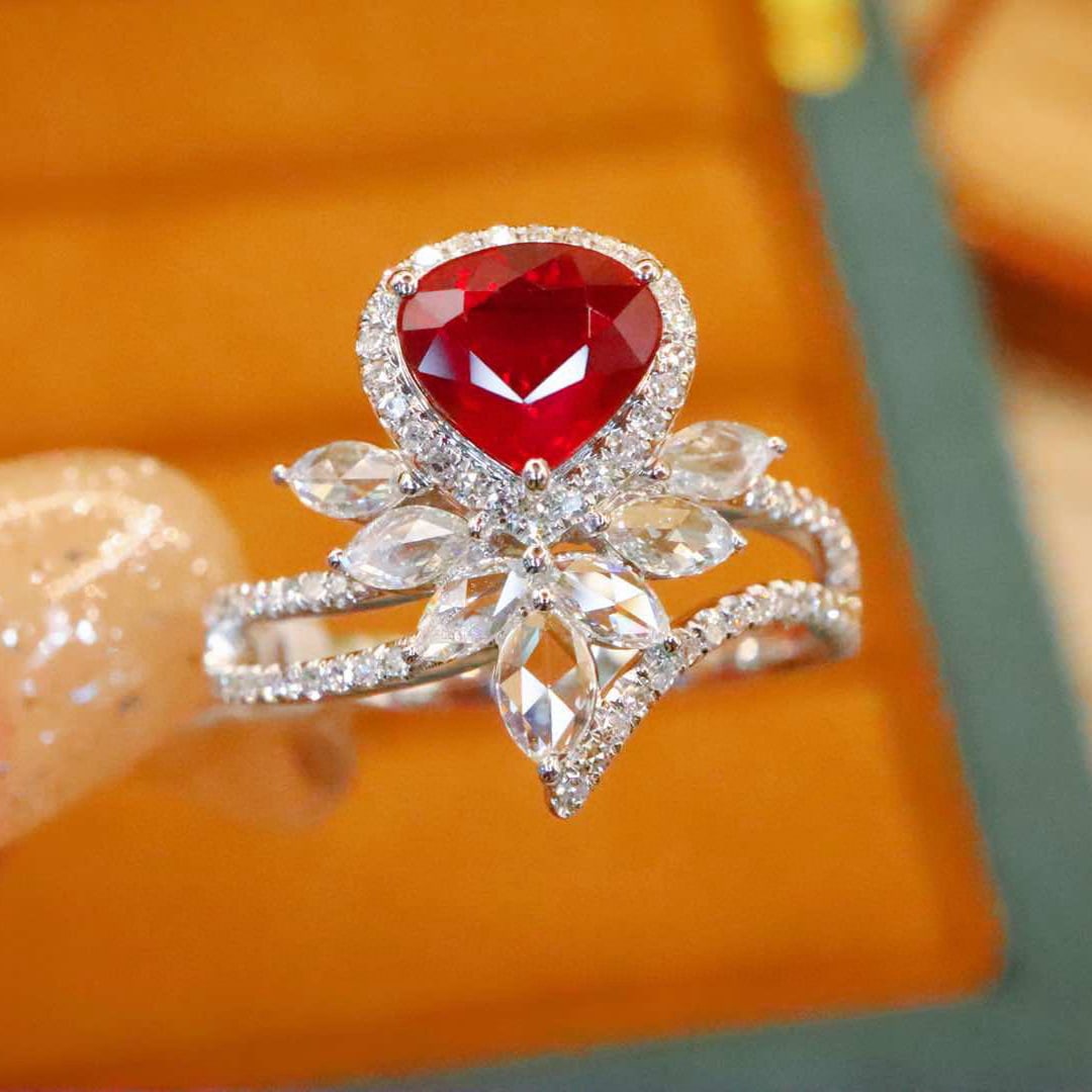 14k Gold 1.48 Ctw Natural Ruby & Diamond Ring: Ref:230984193 // gold content:14k gold // ring size:7. 25us // // main gemstone:ruby // shape:pear // carat weight:1. 00ct // color:pigeonblood red // treatment:natural // // adjacent gemstone 2 : dia