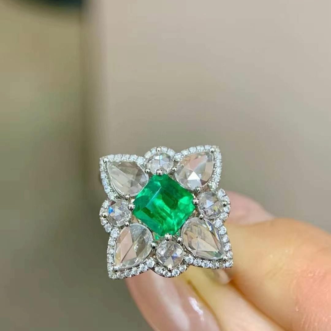 14k Gold 1.53 Ctw Vivid Green Natural Emerald & Diamond Ring: Ref:230984197 // gold content:14k gold // ring size:7. 25us // // main gemstone:emerald // shape:octagonal // carat weight:0. 71ct // color:vivid green // treatment:natural // // adjacent gemstone 2 :