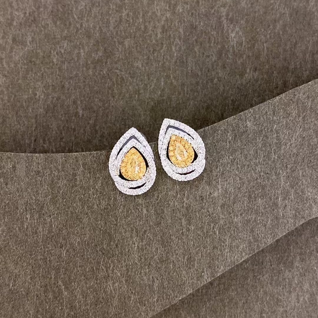 14k Gold 0.50 Ctw Natural Yellow Diamond & Diamond Earrings: Ref:230984217 // gold content:14k gold // main gemstone:yellow diamond // shape:pear // carat weight:0. 18ct // color:yellow // treatment:natural // // adjacent gemstone 2 : diamond // shape:round // 