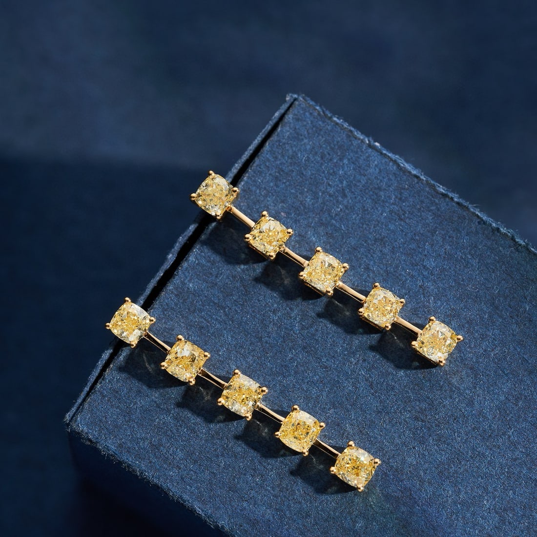 14k Gold 0.92 Ct Natural Yellow Diamond Earrings: Ref:230984223 // gold content:14k gold // main gemstone:yellow diamond // shape:cushion // carat weight:0. 92ct // color:yellow // treatment:natural // Condition: New High Estimate: 5000 Low