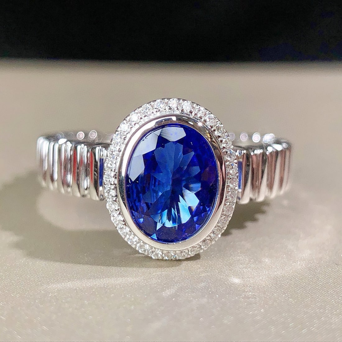14k Gold 1.34 Ctw Natural Tanzanite & Diamond Ring: Ref:230984245 // gold content:14k gold // ring size:7. 25us // // main gemstone:tanzanite // shape:oval // carat weight:1. 25ct // color:blue // treatment:natural // // adjacent gemstone 2 : diamond