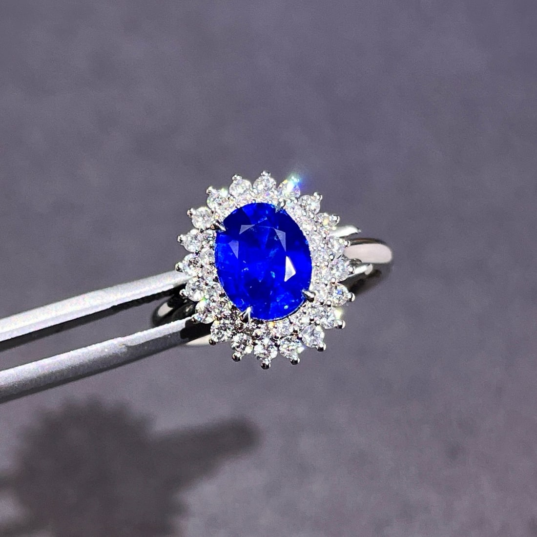 14k Gold 3.05 Ctw Natural Sapphire & Diamond Ring: Ref:230984318 // gold content:14k gold // ring size:7. 25us // // main gemstone:sapphire // shape:oval // carat weight:2. 5ct // color:royal blue // treatment:natural // // adjacent gemstone 2 :