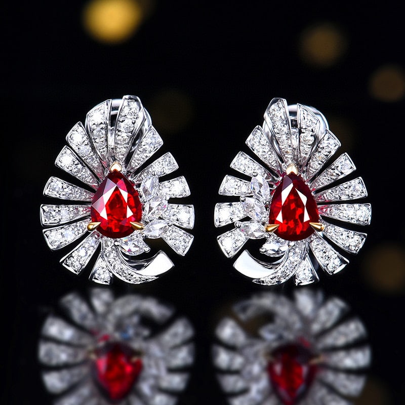 14k Gold 1.54 Ctw Natural Ruby & Diamond Earrings: Ref:230984356 // gold content:14k gold // main gemstone:ruby // shape:pear // carat weight:0. 98ct // color:pigeonblood red // treatment:natural // // adjacent gemstone 2 : diamond // number of stones