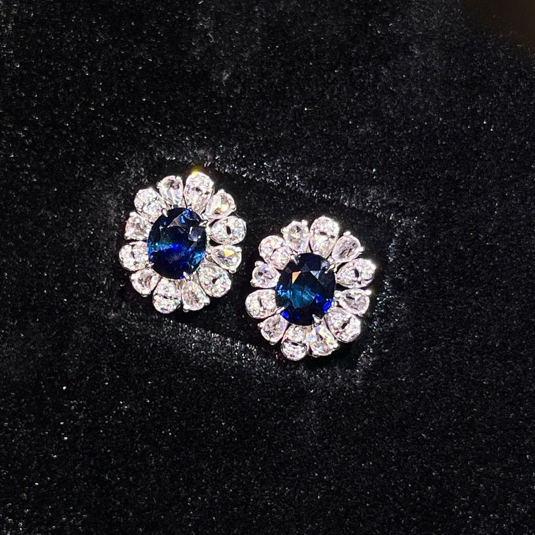 14k Gold 1.87 Ctw Natural Sapphire & Diamond Earrings: Ref:230984370 // gold content:14k gold // main gemstone:sapphire // shape:oval // carat weight:1. 39ct // color:blue // treatment:natural // // adjacent gemstone 2 : diamond // number of stones:48 //