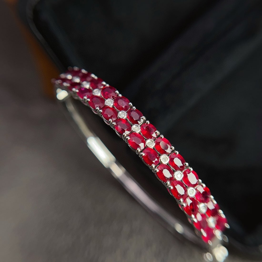 14k Gold 7.20 Ct Natural Ruby & Diamond Bangle: Ref:230984403 // gold content:14k gold // main gemstone:ruby // shape:oval // carat weight:7. 20ct // color:red // treatment:natural // // adjacent gemstone 2 : diamond // number of stones:15 //