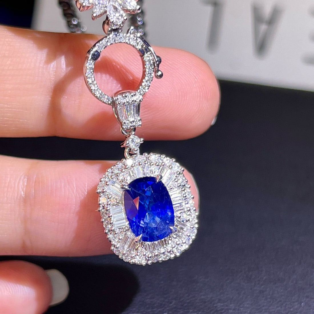 14k Gold 2.95 Ctw Natural Sapphire & Diamond Pendant( Without Chain ): Ref:230984423 // gold content:14k gold // main gemstone:sapphire // shape:oval // carat weight:2. 38ct // color:blue // treatment:natural // // adjacent gemstone 2 : diamond // number of stones:61 //