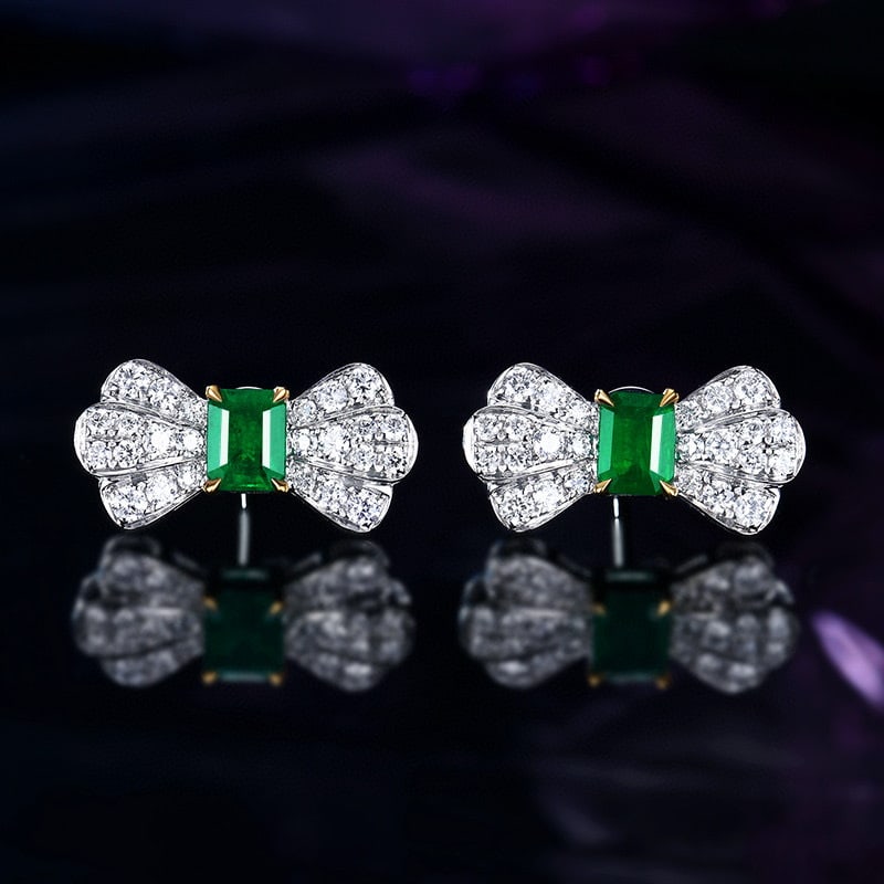 14k Gold 1.40 Ctw Vivid Green Natural Emerald & Diamond Earrings: Ref:230984444 // gold content:14k gold // main gemstone:emerald // shape:octagonal // carat weight:0. 77ct // color:vivid green // treatment:natural // // adjacent gemstone 2 : diamond // number of