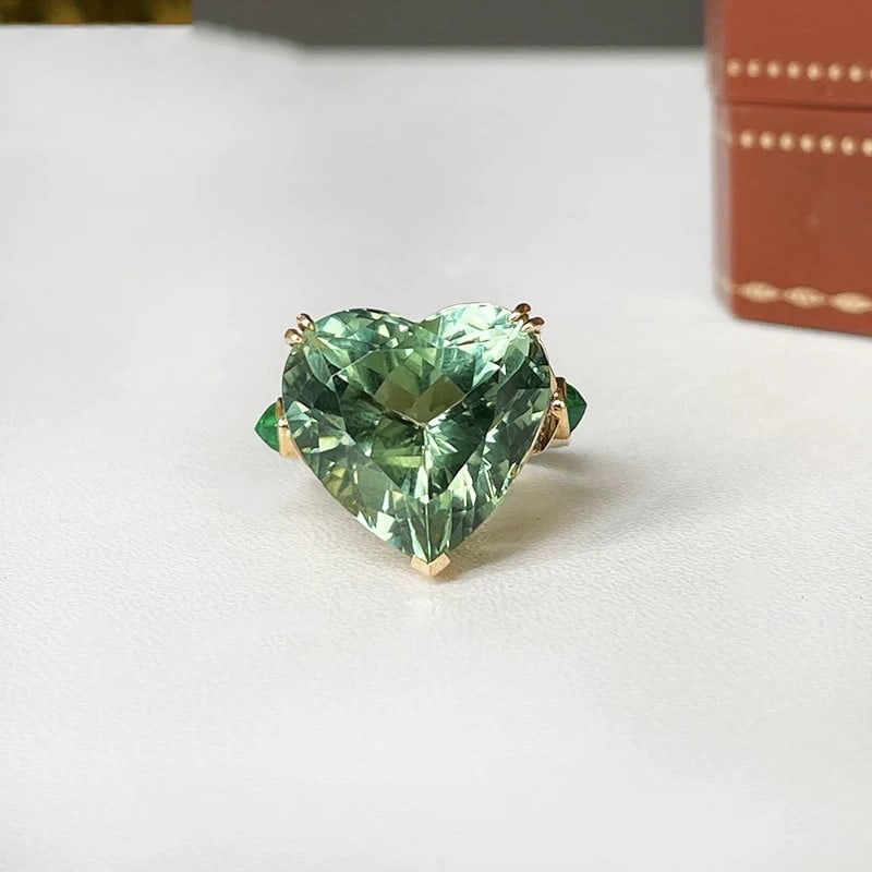 14k Gold 16.51 Ctw Natural Tourmaline & Emerald Ring: Ref:230985002 // gold content:14k gold // ring size:7. 25us // // main gemstone:tourmaline // shape:heart // carat weight:16. 25ct // color:mint green // treatment:natural // // adjacent gemstone 2 : 