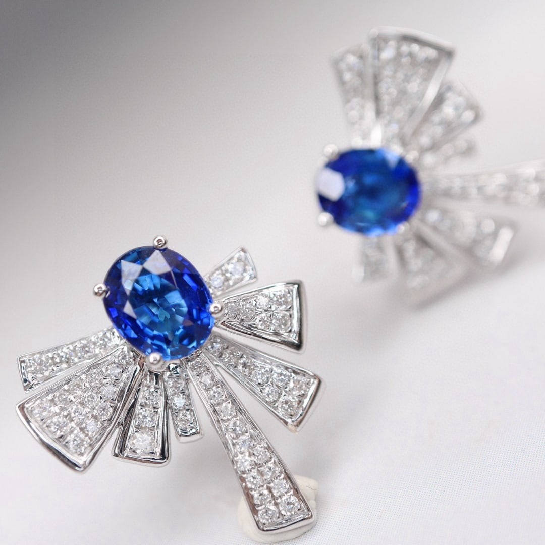 14k Gold 2.5 Ctw Natural Sapphire & Diamond Earrings: Ref:230985024 // gold content:14k gold // main gemstone:sapphire // shape:oval // carat weight:2. 0ct // color:blue // treatment:natural // // adjacent gemstone 2 : diamond // shape:round // carat