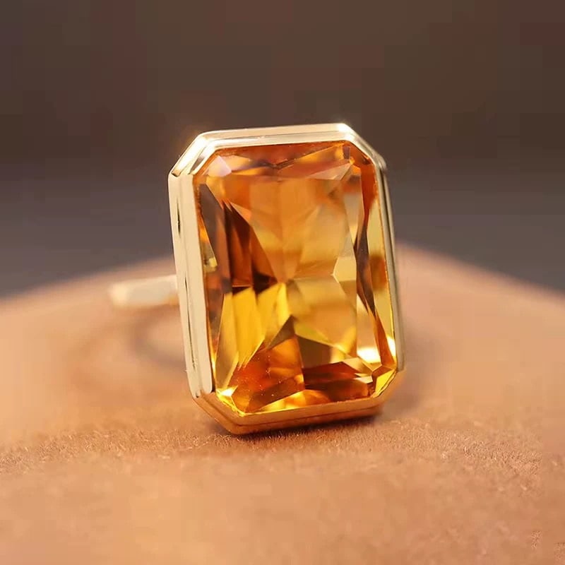 14k Gold 7.0 Ct Natural Citrine Ring: Ref:230985034 // gold content:14k gold // ring size:7. 25us // // main gemstone:citrine // shape:radiant // carat weight:7. 0ct // color:yellow // treatment:natural // Condition: New Low Estimate: