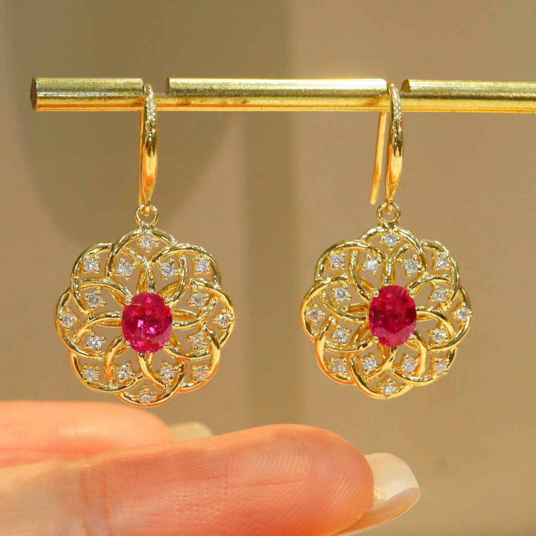 14k Gold 1.52 Ctw Natural Ruby & Diamond Earrings: Ref:230985038 // gold content:14k gold // main gemstone:ruby // shape:oval // carat weight:1. 2ct // color:red // treatment:natural // // adjacent gemstone 2 : diamond // shape:round // carat