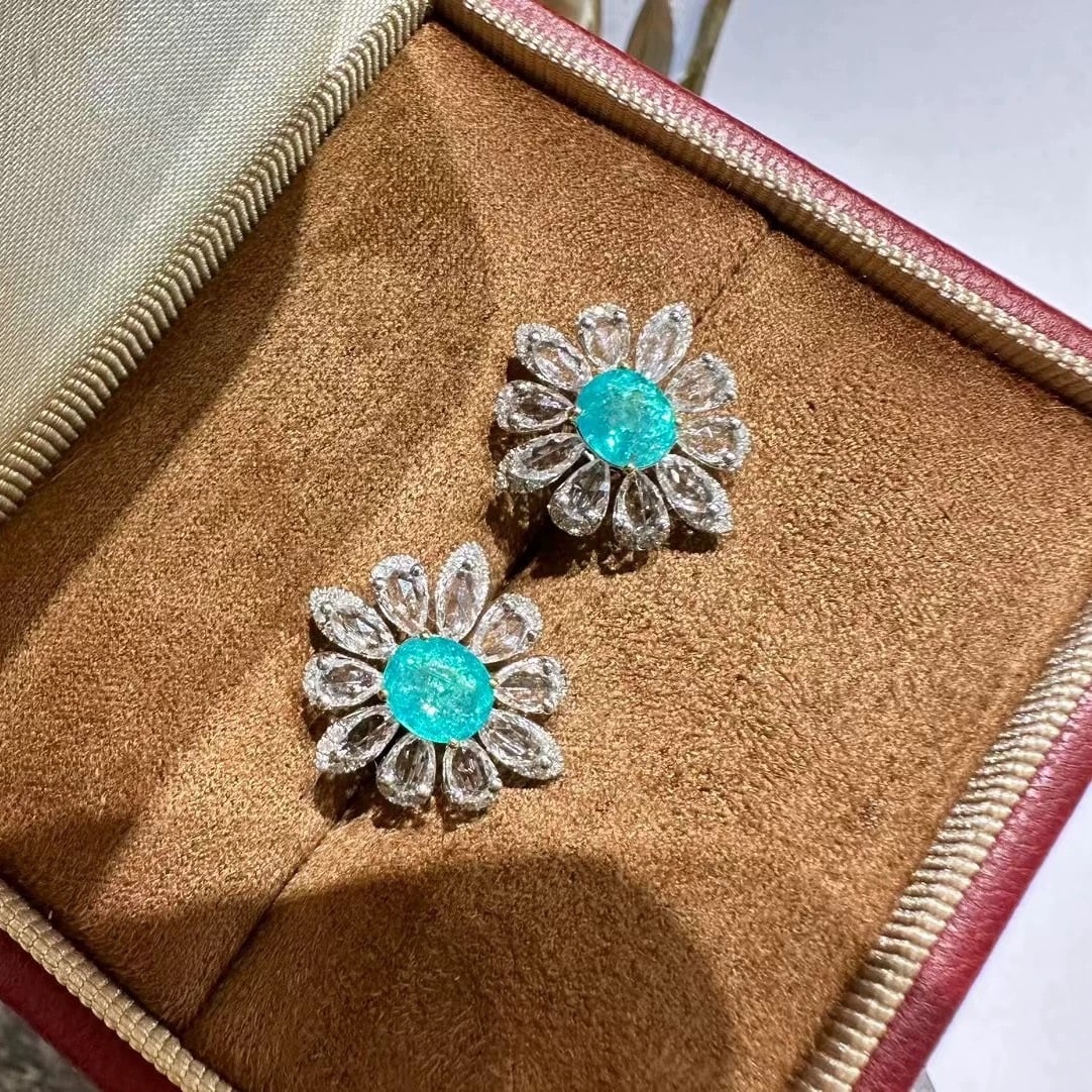 14k Gold 1.3 Ct Natural Paraiba Tourmaline & Sapphire & Diamond Earrings: Ref:230985046 // gold content:14k gold // main gemstone:paraiba tourmaline // shape:oval // carat weight:1. 3ct // color:neon blue // treatment:natural // // adjacent gemstone 2 : sapphire // shape:pe