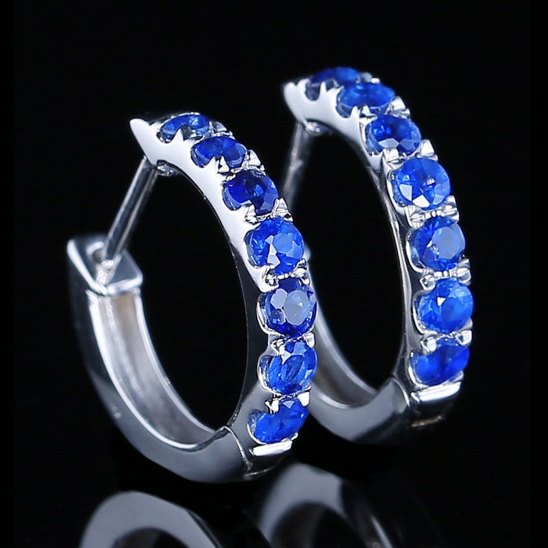 14k Gold 0.57 Ct Natural Sapphire Earrings: Ref:230985054 // gold content:14k gold // main gemstone:sapphire // shape:round // carat weight:0. 57ct // color:blue // treatment:natural // cut grade:g // Condition: New Low Estimate: 1300.00 High