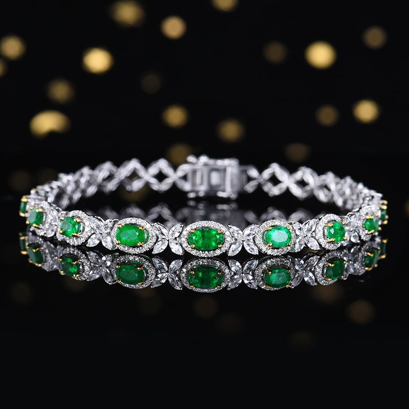 14k Gold 2.57 Ctw Natural Emerald & Diamond Bracelet: Ref:230985057 // gold content:14k gold // main gemstone:emerald // shape:oval // carat weight:2. 11ct // color:green // treatment:natural // // adjacent gemstone 2 : diamond // number of stones:184