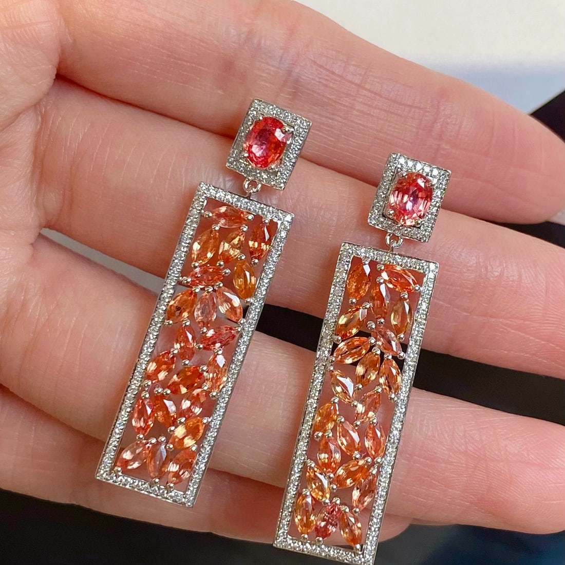 14k Gold 4.74 Ctw Natural Padparadscha Sapphire & Padparadscha Sapphire Earrings: Ref:230985074 // gold content:14k gold // main gemstone:padparadscha sapphire // shape:oval // carat weight:0. 83ct // color:orangish pink // treatment:natural // // adjacent gemstone 2 :