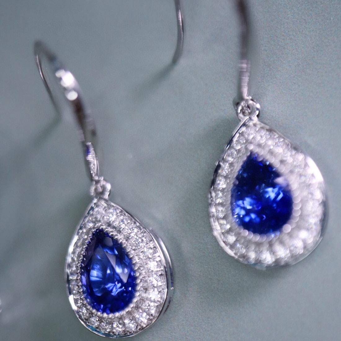 14k Gold 2.25 Ctw Natural Sapphire & Diamond Earrings: Ref:230985094 // gold content:14k gold // main gemstone:sapphire // shape:pear // carat weight:2. 02ct // color:blue // treatment:natural // // adjacent gemstone 2 : diamond // shape:round // carat