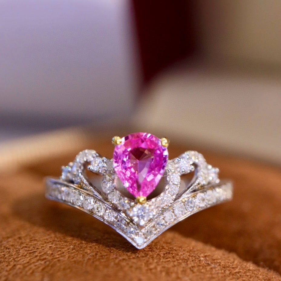 14k Gold 0.86 Ctw Natural Padparadscha Sapphire & Diamond Ring: Ref:230985109 // gold content:14k gold // ring size:7. 25us // // main gemstone:padparadscha sapphire // shape:pear // carat weight:0. 6ct // color:pink // treatment:natural // // adjacent gemstone 2 