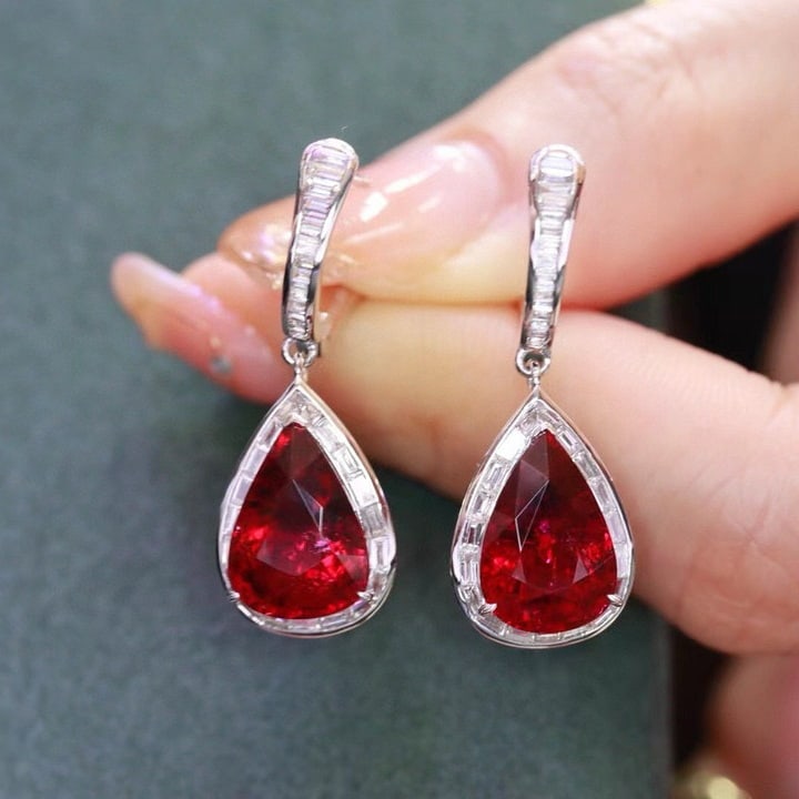 14k Gold 8.94 Ctw Natural Tourmaline & Diamond Earrings: Ref:230985112 // gold content:14k gold // main gemstone:tourmaline // shape:pear // carat weight:8. 1ct // color:rubellite // treatment:natural // // adjacent gemstone 2 : diamond // shape:baguette //