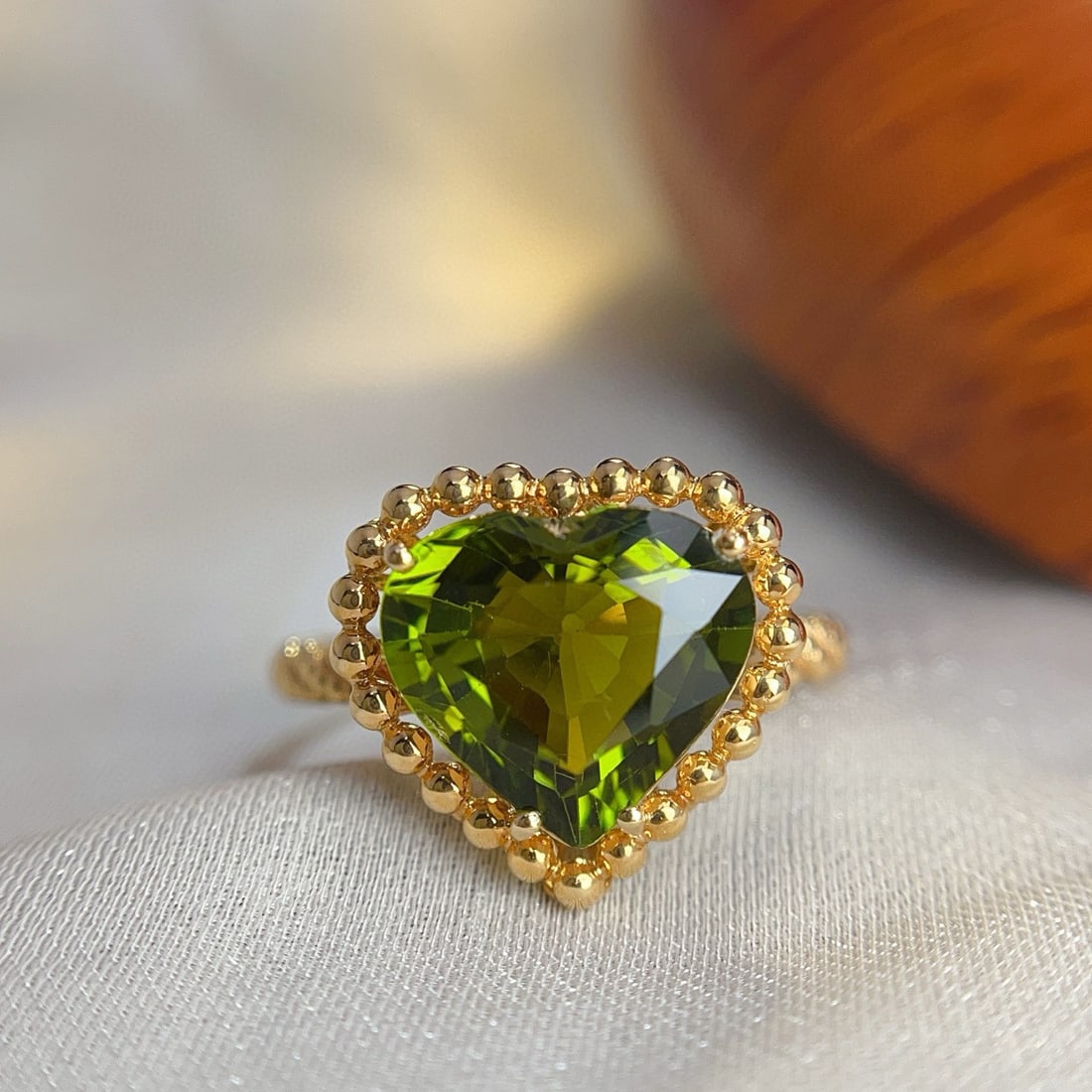 14k Gold 3.9 Ct Natural Tourmaline Ring: Ref:230985119 // gold content:14k gold // ring size:7. 25us // // main gemstone:tourmaline // shape:heart // carat weight:3. 9ct // color:green // treatment:natural // Condition: New Low Estimate: