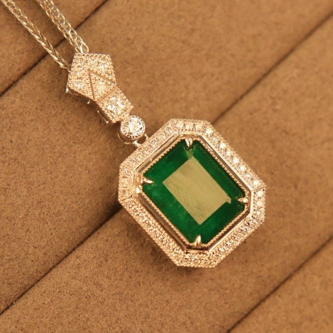 14k Gold 6.56 Ctw Natural Emerald & Diamond Pendant( Without Chain ): Ref:230985155 // gold content:14k gold // main gemstone:emerald // shape:octagonal // carat weight:6. 12ct // color:green // treatment:natural // // adjacent gemstone 2 : diamond // shape:round //