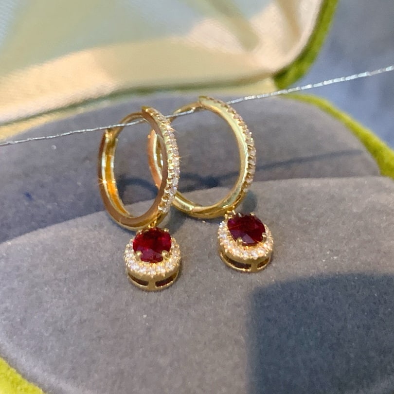 14k Gold 0.8 Ctw Natural Ruby & Diamond Earrings: Ref:230985164 // gold content:14k gold // main gemstone:ruby // shape:oval // carat weight:0. 6ct // color:red // treatment:natural // // adjacent gemstone 2 : diamond // shape:round // carat weight:0