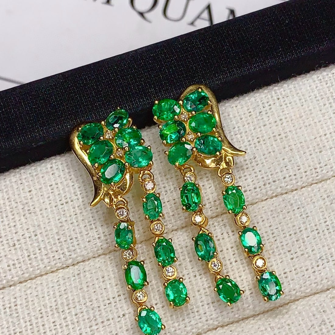 14k Gold 3.8 Ct Natural Emerald & Diamond Earrings: Ref:230985184 // gold content:14k gold // main gemstone:emerald // shape:oval // carat weight:3. 8ct // color:green // treatment:natural // // adjacent gemstone 2 : diamond // number of stones:16 // s