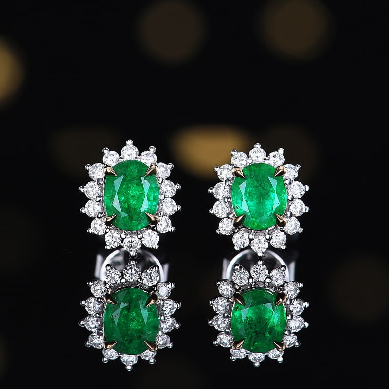 14k Gold 0.79 Ctw Vivid Green Natural Emerald & Diamond Earrings: Ref:230986038 // gold content:14k gold // main gemstone:emerald // shape:oval // carat weight:0. 57ct // color:vivid green // treatment:natural // // adjacent gemstone 2 : diamond // number of