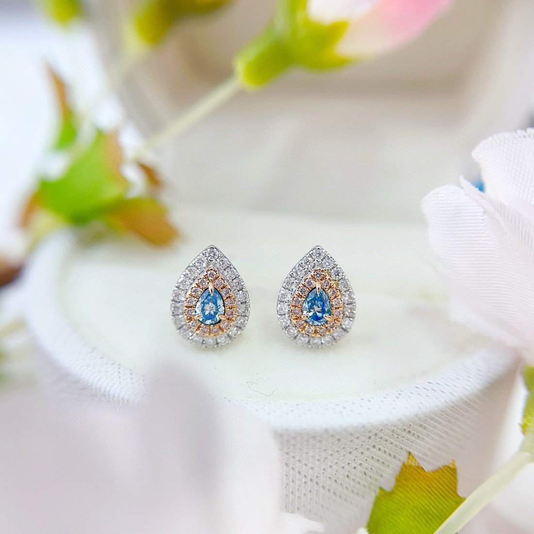 14k Gold 0.62 Ctw Natural Blue Diamond & Diamond Earrings: Ref:230986046 // gold content:14k gold // main gemstone:blue diamond // shape:pear // carat weight:0. 24ct // color:blue // treatment:natural // // adjacent gemstone 2 : diamond // shape:round //
