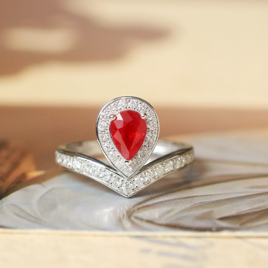 14k Gold 1.49 Ctw Natural Ruby & Diamond Ring: Ref:230986061 // gold content:14k gold // ring size:7. 25us // // main gemstone:ruby // shape:pear // carat weight:1. 05ct // color:pigeonblood red // treatment:natural // // adjacent gemstone 2 :