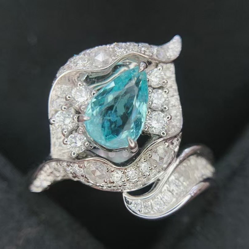 14k Gold 1.80 Ctw Natural Paraiba Tourmaline & Diamond Ring: Ref:230986086 // gold content:14k gold // ring size:7. 25us // // main gemstone:paraiba tourmaline // shape:pear // carat weight:1. 05ct // color:blue // treatment:natural // // adjacent gemstone 2 :
