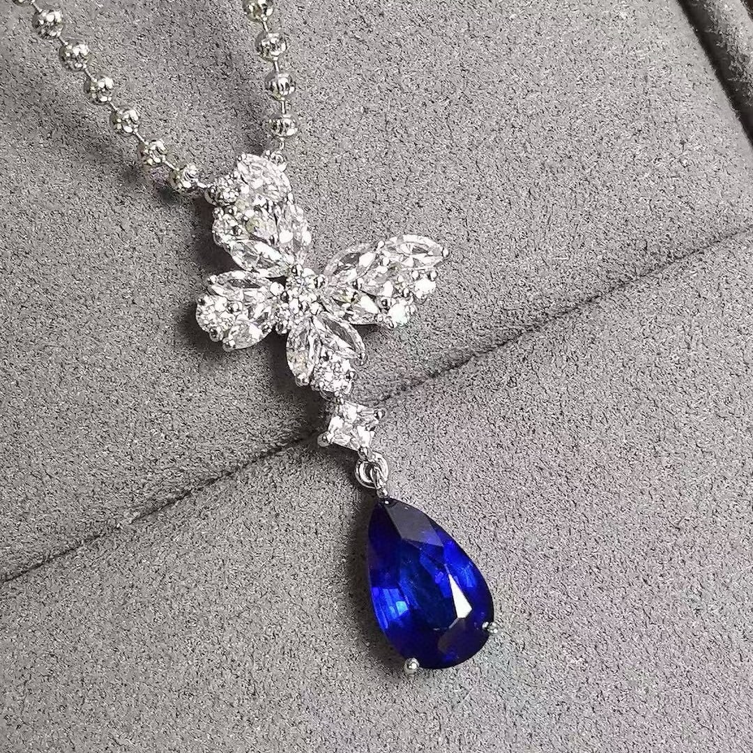 14k Gold 1.49 Ctw Natural Sapphire & Diamond Pendant( Without Chain ): Ref:230986107 // gold content:14k gold // main gemstone:sapphire // shape:pear // carat weight:1. 39ct // color:royal blue // treatment:natural // // adjacent gemstone 2 : diamond // shape:round // ca