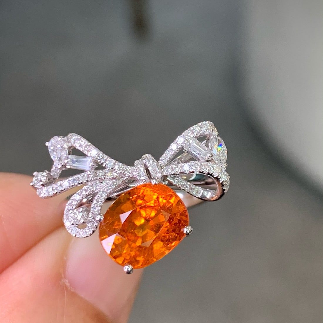 14k Gold 4.59 Ctw Natural Spessartine & Diamond Ring: Ref:230986108 // gold content:14k gold // ring size:7. 25us // // main gemstone:spessartine // shape:oval // carat weight:4. 09ct // color:orange // treatment:natural // // adjacent gemstone 2 :