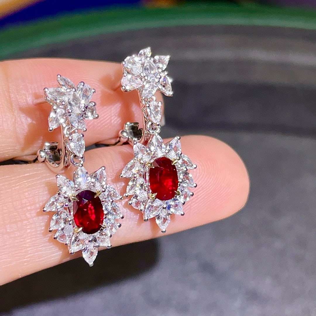14k Gold 3.63 Ctw Natural Ruby & Sapphire Earrings: Ref:230986134 // gold content:14k gold // main gemstone:ruby // shape:oval // carat weight:1. 08ct // color:red // treatment:natural // // adjacent gemstone 2 : sapphire // number of stones:40 //