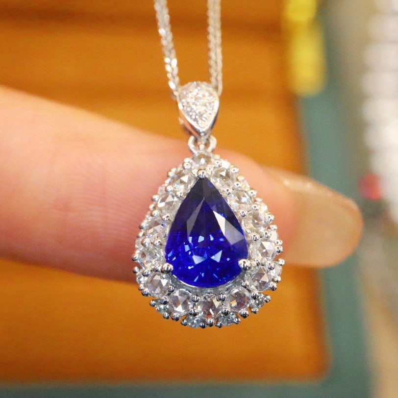 14k Gold 1.80 Ctw Natural Sapphire & Diamond Pendant( Without Chain ): Ref:230986135 // gold content:14k gold // main gemstone:sapphire // shape:pear // carat weight:1. 44ct // color:royal blue // treatment:natural // // adjacent gemstone 2 : diamond // number of stones: