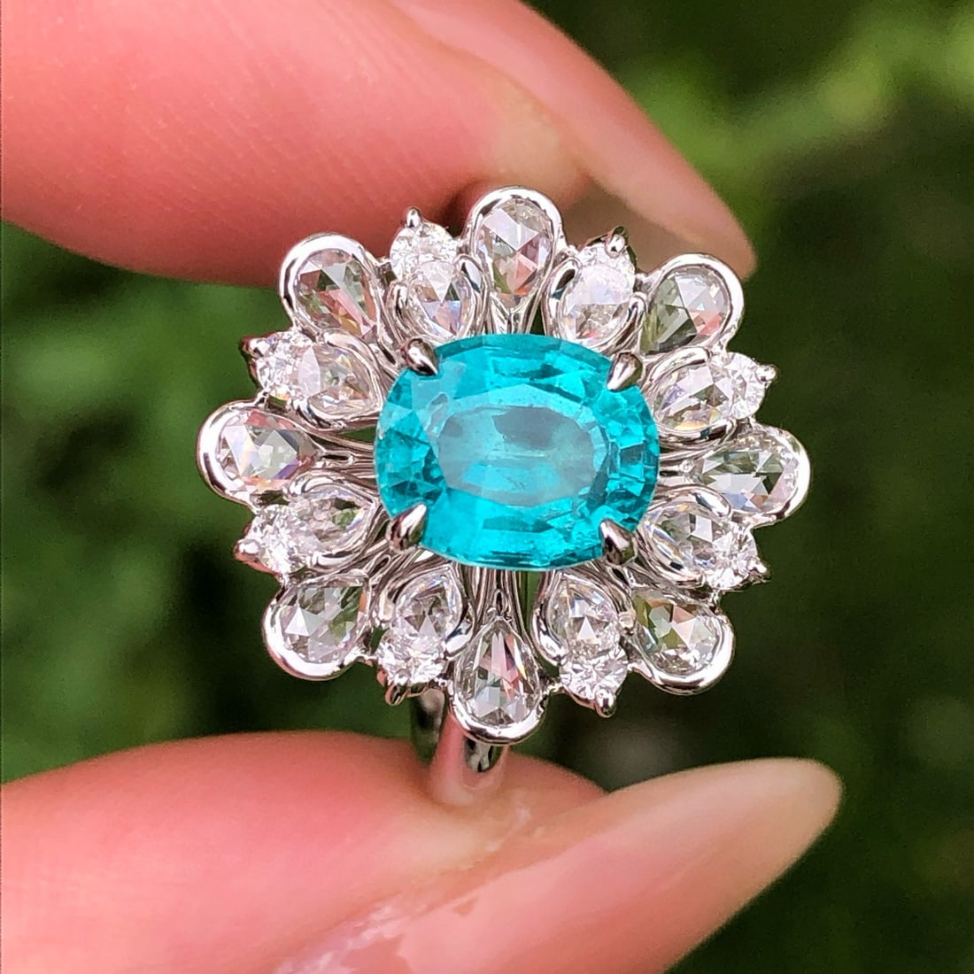 14k Gold 2.87 Ctw Natural Paraiba Tourmaline & Diamond Ring: Ref:230986151 // gold content:14k gold // ring size:7. 25us // // main gemstone:paraiba tourmaline // shape:oval // carat weight:1. 55ct // color:blue // treatment:natural // // adjacent gemstone 2 :