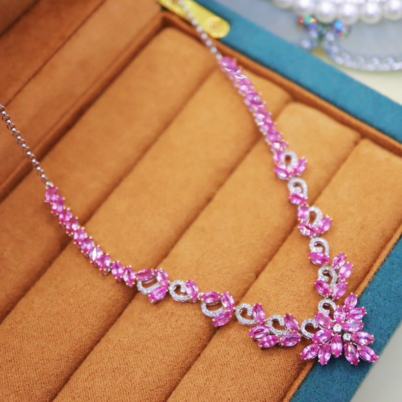 14k Gold 11.03 Ctw Natural Padparadscha Sapphire & Diamond Necklace: Ref:230986161 // gold content:14k gold // main gemstone:padparadscha sapphire // shape:marquise // carat weight:10. 70ct // color:orangish pink // treatment:natural // // adjacent gemstone 2 : diamond