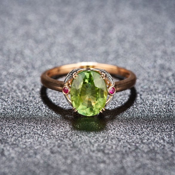 14k Gold 2.25 Ct Natural Tourmaline & Ruby Ring: Ref:230986182 // gold content:14k gold // ring size:7. 25us // // main gemstone:tourmaline // shape:oval // carat weight:2. 25ct // color:green // treatment:natural // // adjacent gemstone 2 : ruby