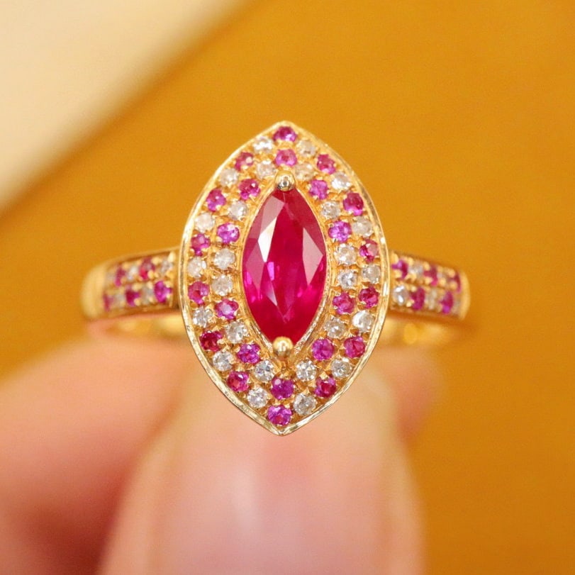 14k Gold 0.61 Ctw Natural Ruby & Diamond Ring: Ref:230986204 // gold content:14k gold // ring size:7. 25us // // main gemstone:ruby // shape:marquise // carat weight:0. 50ct // color:red // treatment:natural // // adjacent gemstone 2 : diamond //