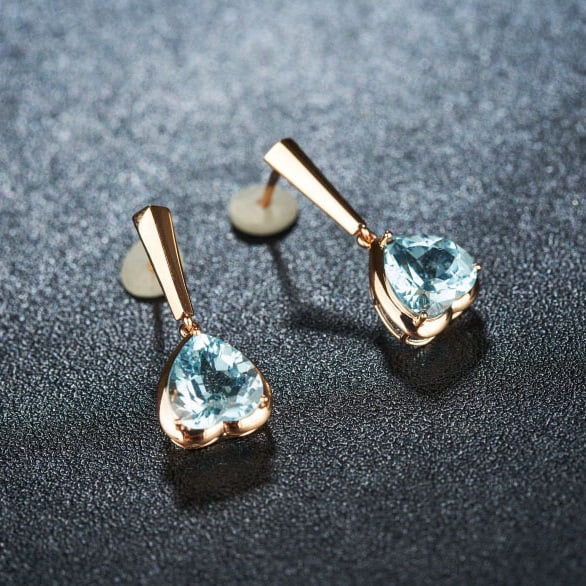 14k Gold 3.16 Ct Natural Aquamarine Earrings: Ref:230986248 // gold content:14k gold // main gemstone:aquamarine // shape:heart // carat weight:3. 16ct // color:blue // treatment:natural // Condition: New Low Estimate: 2100.00 High Estimate: